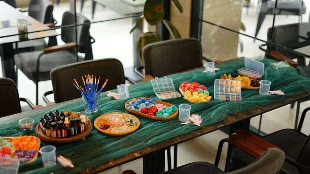 A DIY decoration station with supplies and examples of homemade wedding decor. — creative budget wedding ideas Las Vegas