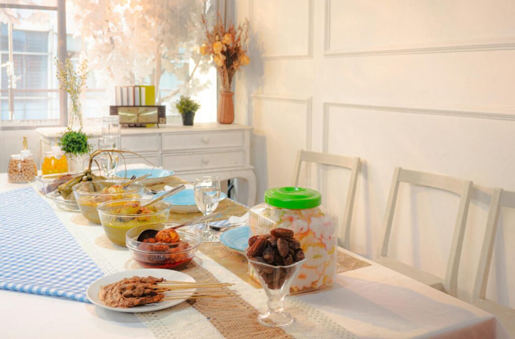 A beautifully arranged table featuring local cuisine for guests. — Las Vegas beach wedding culture