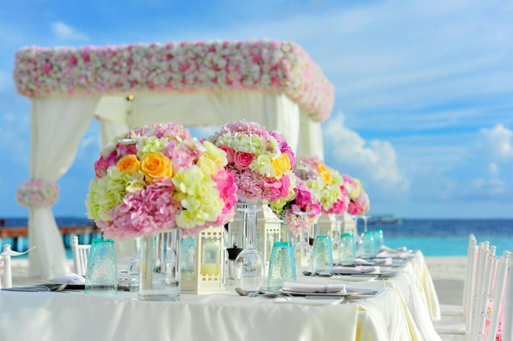 A beautifully set beach wedding table with elegant catering options. — beach wedding catering Las Vegas