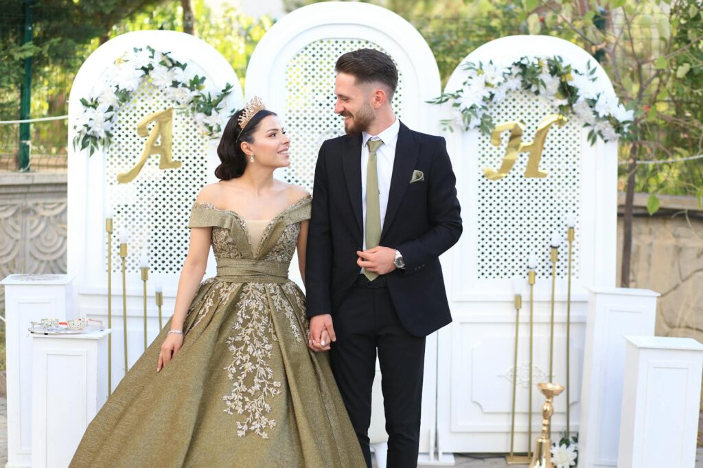 A bride and groom celebrating their wedding with a lively casino backdrop. — casino wedding coordination services Las Vegas