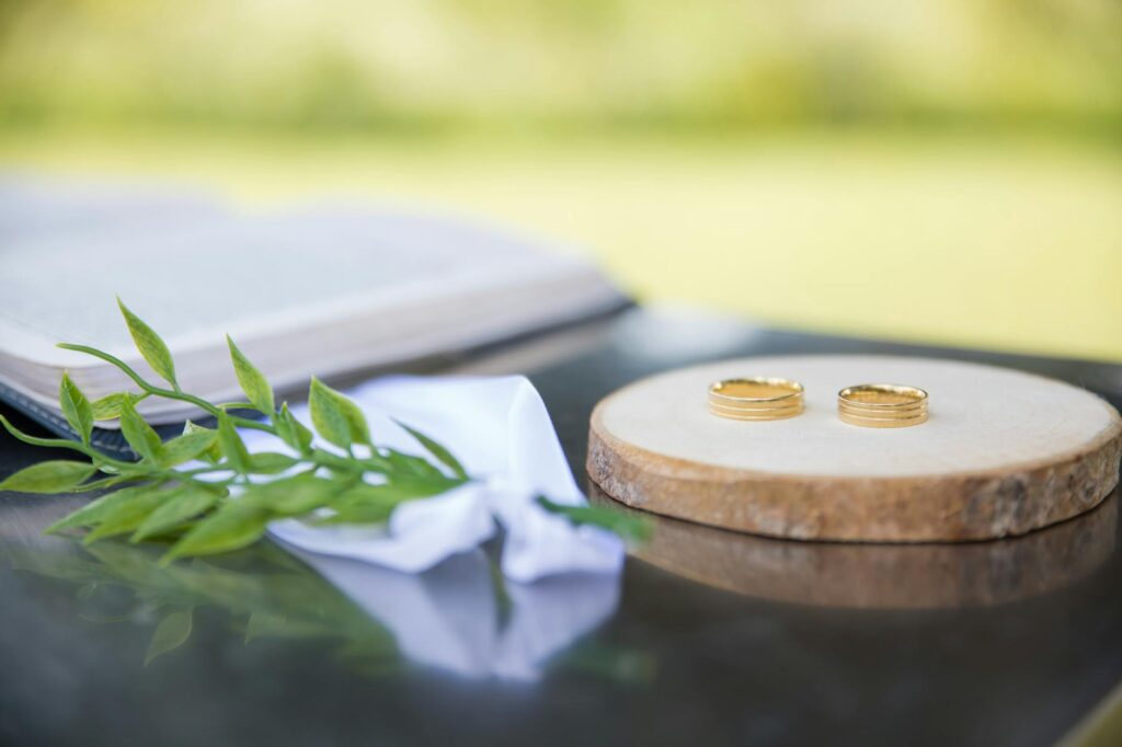 A close-up of a couple's wedding rings on a beautifully styled table setting. — wedding photographers Las Vegas