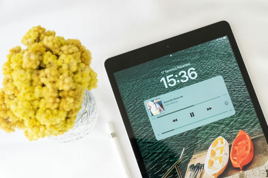 A close-up of a wedding playlist on a phone or tablet, showing a mix of ceremony and reception songs. — beach wedding pl…