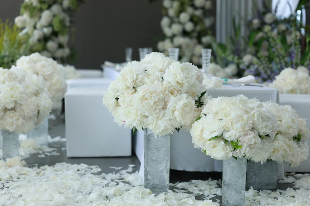 A close-up of wedding ceremony details like themed decorations and centerpieces. — Las Vegas casino wedding ceremony