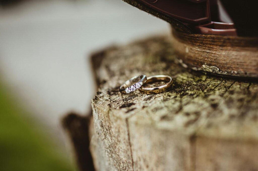 A close-up of wedding rings on a Las Vegas-themed backdrop. — Las Vegas elopement guide