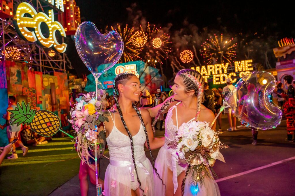 A couple celebrating a themed wedding in Las Vegas with vibrant decorations. — wedding theme ideas Las Vegas