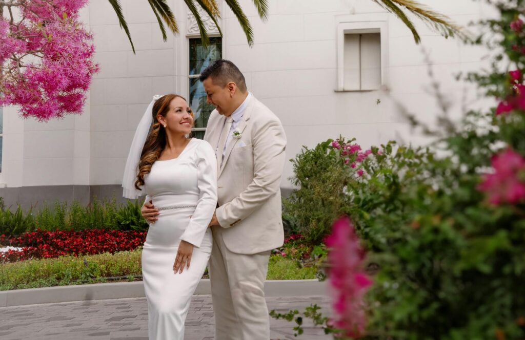 A couple celebrating their wedding day in a beautiful Las Vegas garden during spring. — best times to marry in Las Vegas…