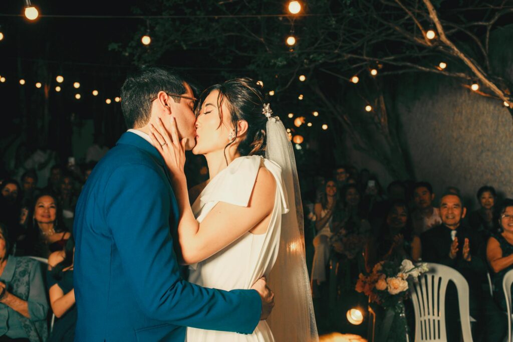 A couple celebrating their wedding with a small, intimate guest list — budget Las Vegas wedding tips