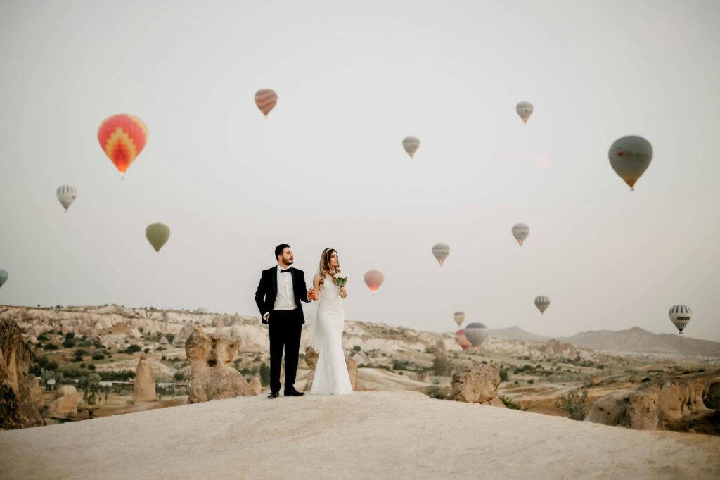 A couple embarking on an adventurous wedding ceremony, like skydiving or hot air ballooning. — unique wedding packages L…