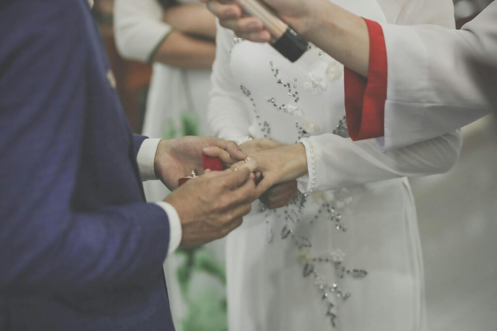 A couple exchanging personalized vows during a themed wedding ceremony. — creative budget wedding ideas Las Vegas