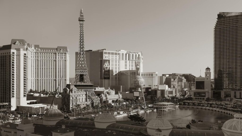 A couple exchanging vows in front of the Eiffel Tower Experience in Las Vegas. — unique wedding venues Las Vegas