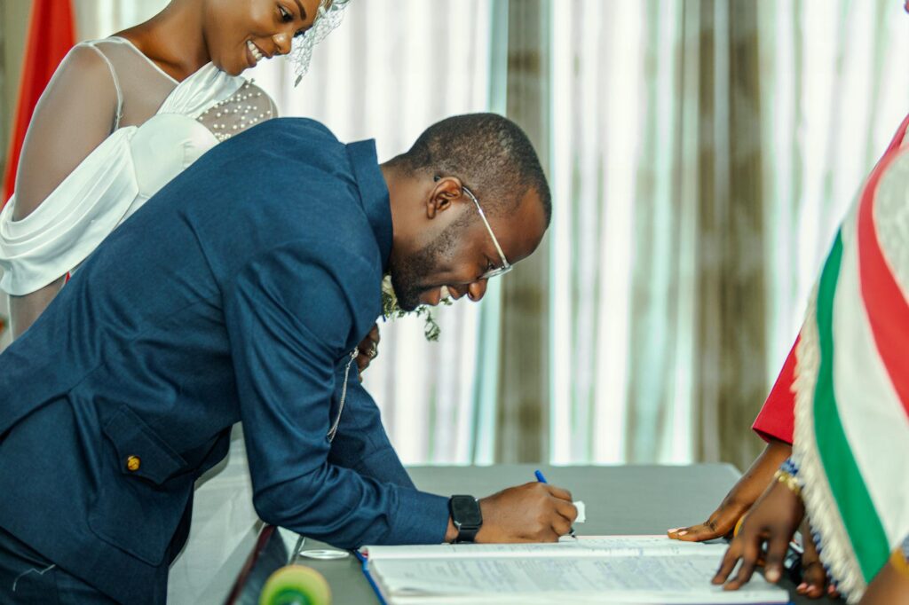 A couple reviewing wedding packages with a planner in a serene environment — wedding packages Las Vegas