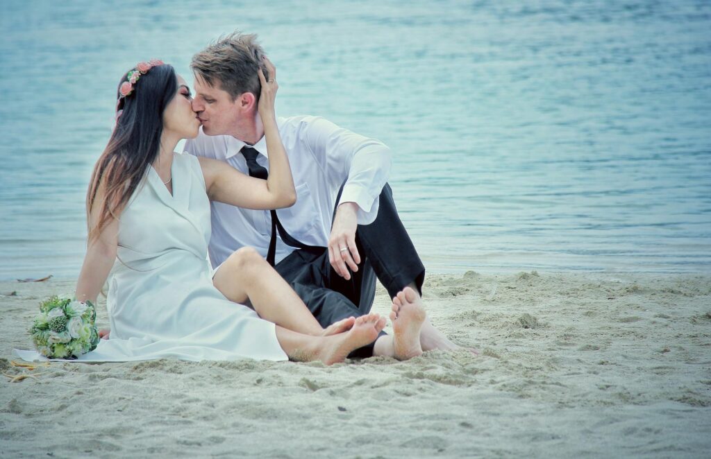 A happy couple celebrating their wedding day on a Las Vegas beach. — Las Vegas beach wedding legal requirements