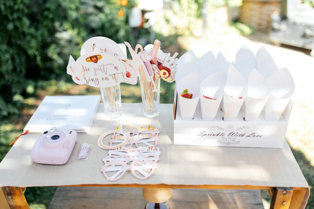 A photo booth setup with fun props for guests to take pictures — casino wedding after-party ideas