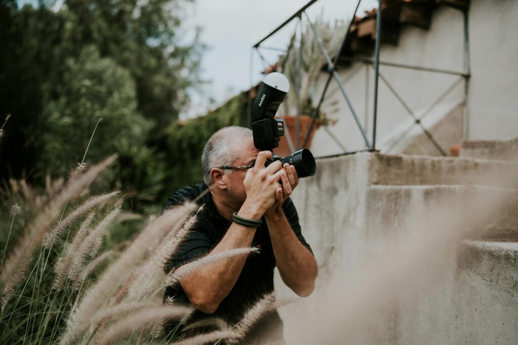 A professional photographer capturing a couple's candid moments in iconic Las Vegas locations. — Las Vegas elopement pla…