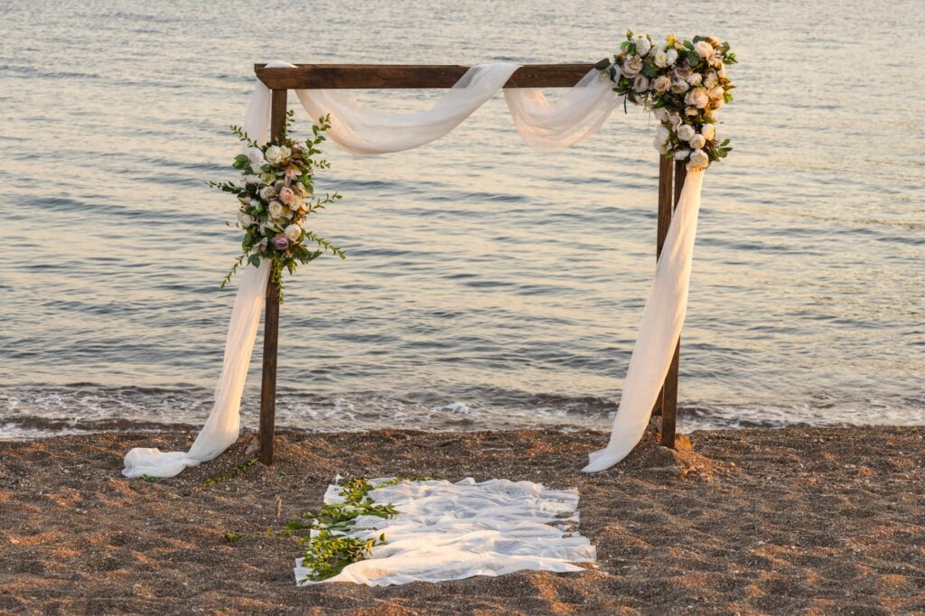 A stunning beach wedding setup at sunset, showcasing the beautiful venue and decor. — beach wedding photographer Las Vegas