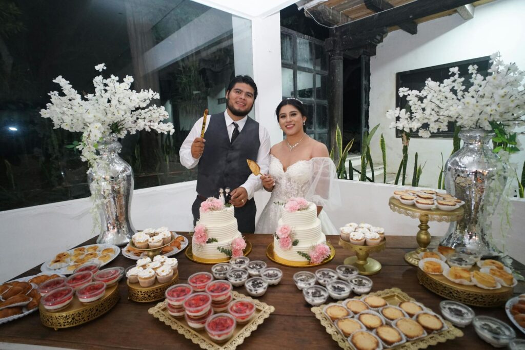 A wedding cake cutting ceremony, highlighting a stylish yet affordable cake. — affordable wedding cakes Las Vegas