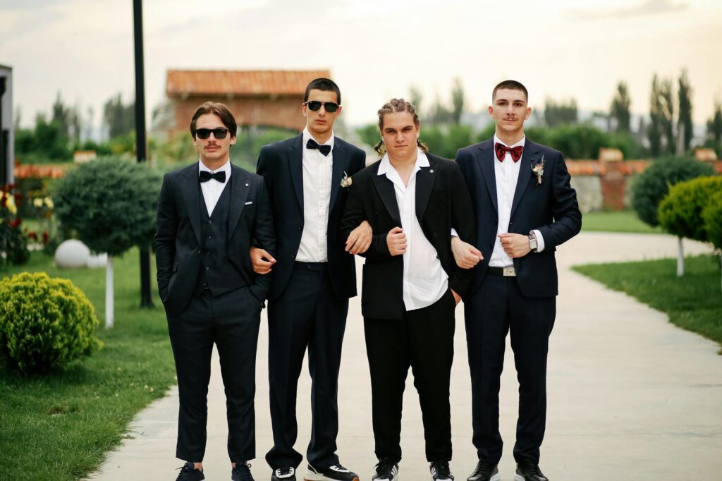 A wedding party dressed in varying styles of attire that comply with formal wedding dress codes. — casino wedding dress …
