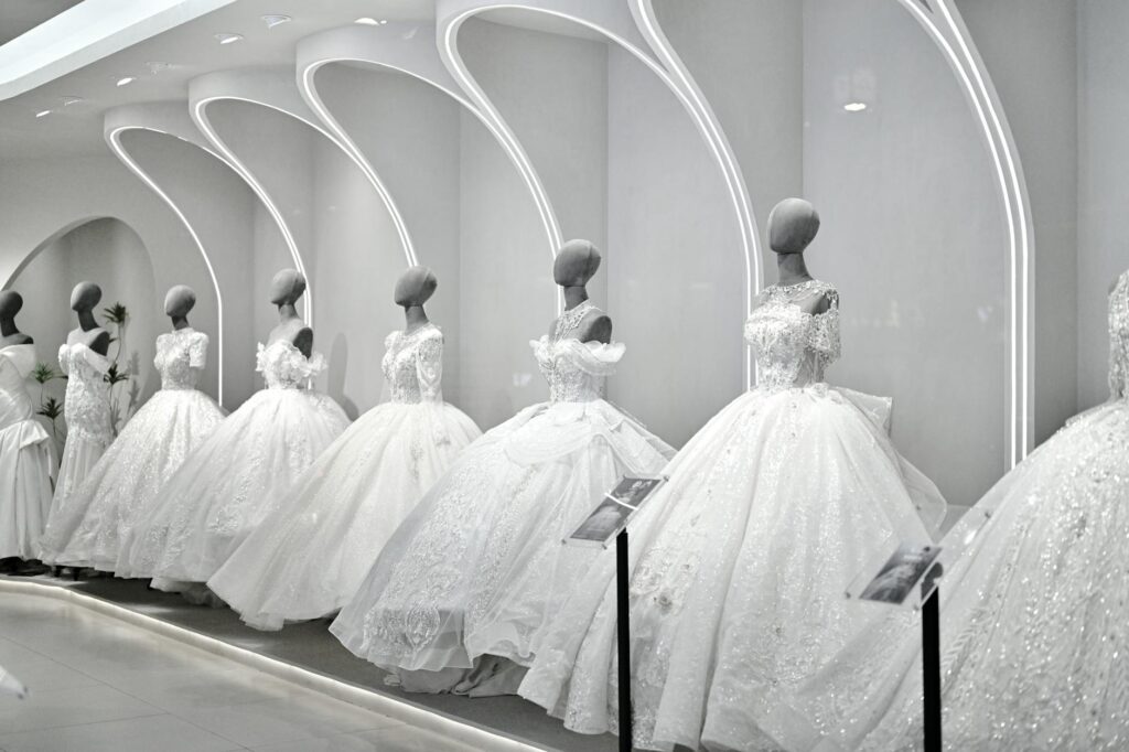 An assortment of affordable bridal gowns displayed in a boutique — cheap wedding dresses Las Vegas