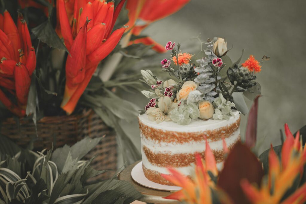 An elopement package offer showcasing flowers, a cake, and photography. — Las Vegas elopement