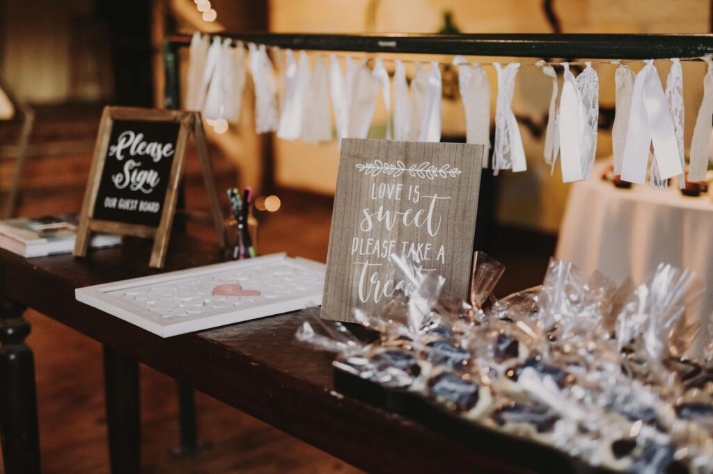 An example of a budget-friendly DIY wedding favor assembly station featuring DIY casino wedding favors.