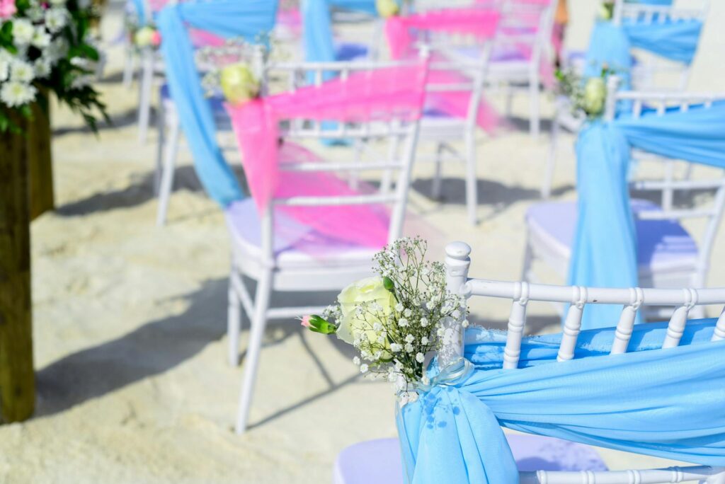 Beautiful floral arrangements and decorations set up for a beach wedding. — beach wedding ceremony ideas Las Vegas