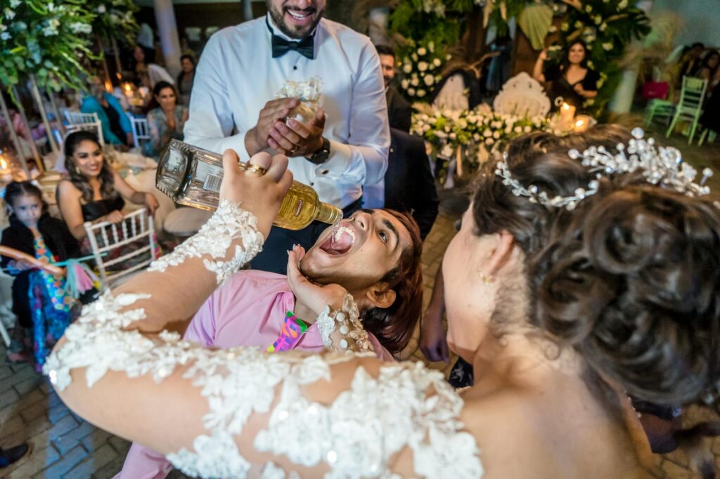 Guests enjoying a game of blackjack at a wedding reception, laughing and having fun. — casino games wedding reception