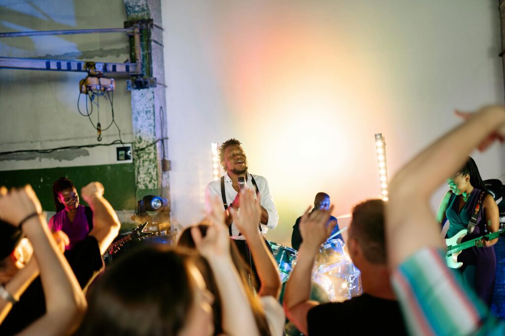 Guests enjoying a live show at a casino wedding, with performers entertaining the crowd. — casino wedding entertainment …