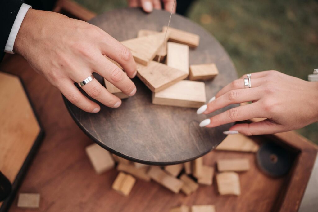Guests enjoying interactive games at a wedding, highlighting affordable entertainment. — affordable wedding entertainmen…