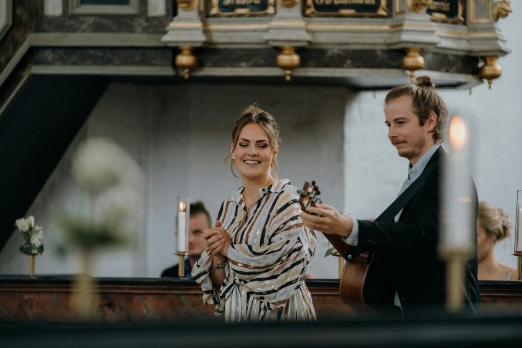 Local musicians performing at a beach wedding ceremony. — Las Vegas beach wedding culture