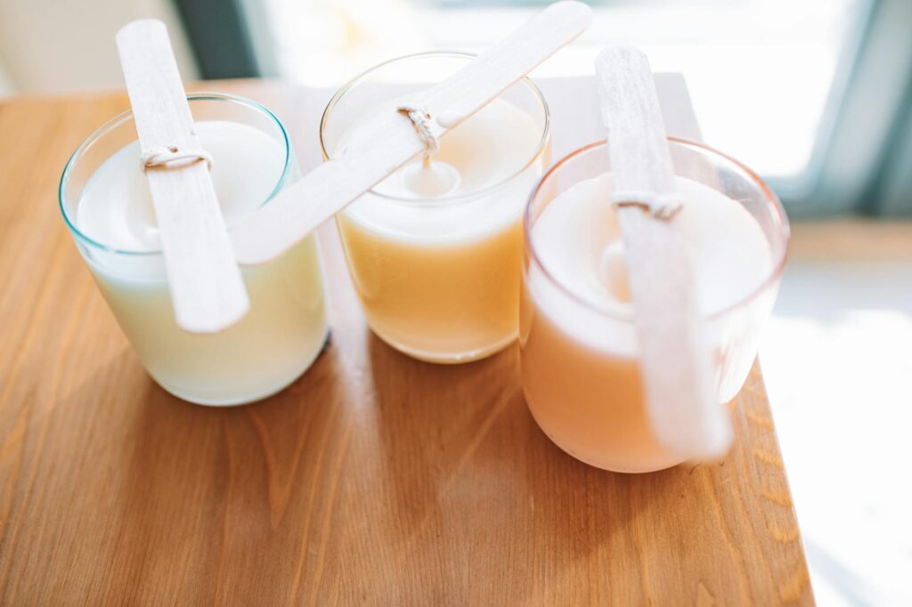 Step-by-step photos of preparing beach-inspired candles for wedding favors. — DIY beach wedding favors Las Vegas