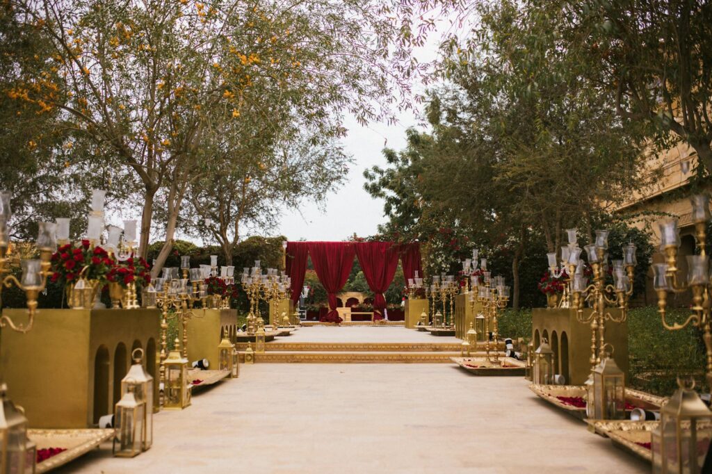 A beautifully decorated vintage glam wedding setup featuring elegant furniture and rich colors. — Las Vegas wedding themes