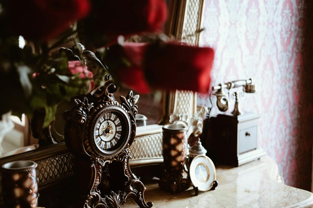 A beautifully decorated vintage wedding setup with antique furniture and retro accents. — unique wedding themes Las Vegas