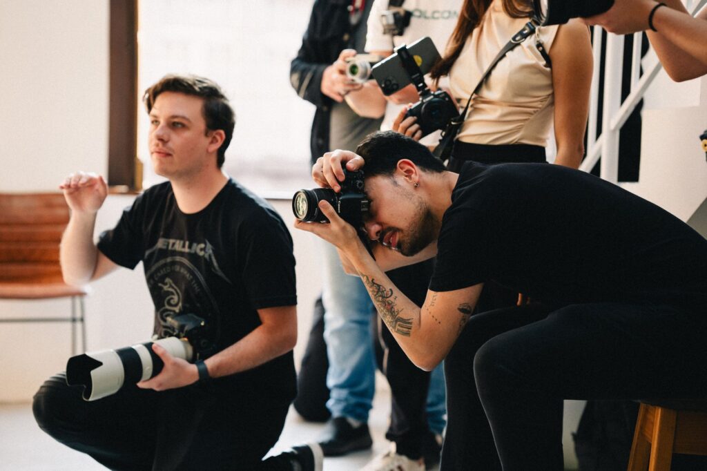 A behind-the-scenes look at photographers working during a wedding, highlighting the teamwork involved. — Las Vegas wedd…