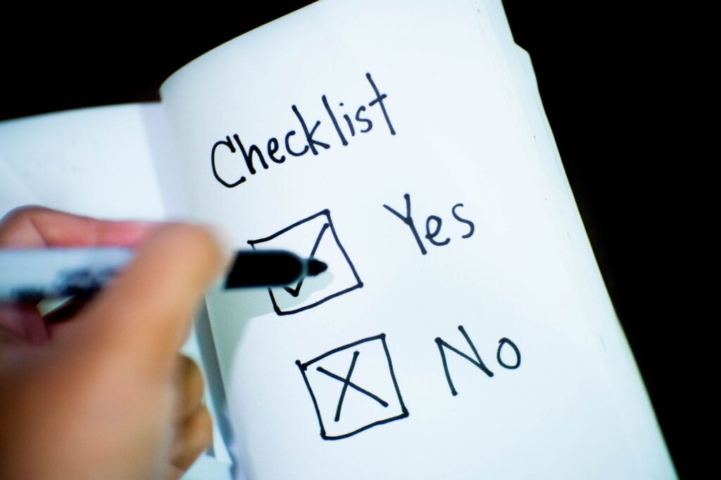 A checklist with wedding planning items being ticked off. — Las Vegas wedding checklist