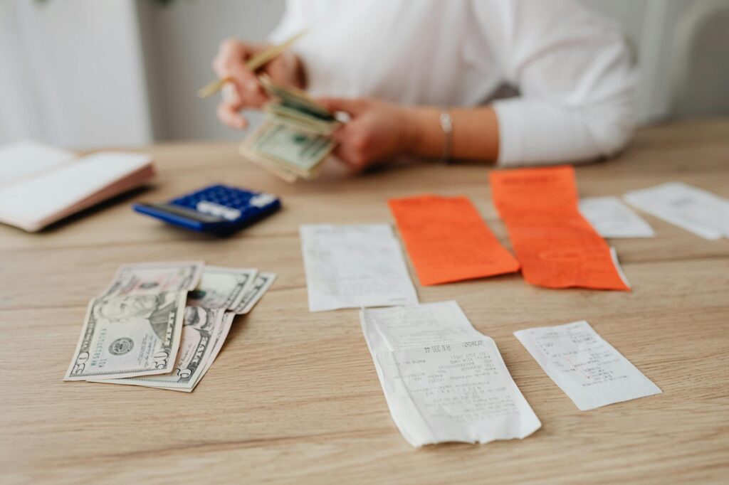 A close-up of a wedding budget planning sheet with detailed cost breakdowns. — Las Vegas wedding concierge services
