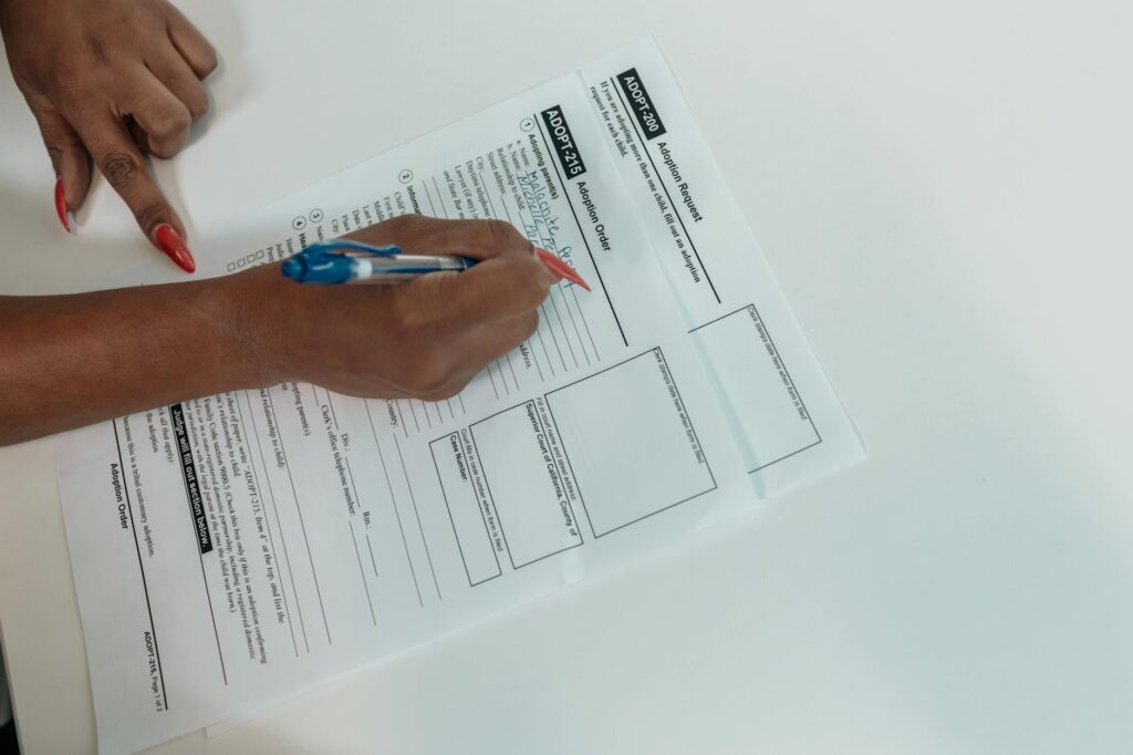 A close-up of the wedding license application form with pens ready. — Las Vegas wedding license