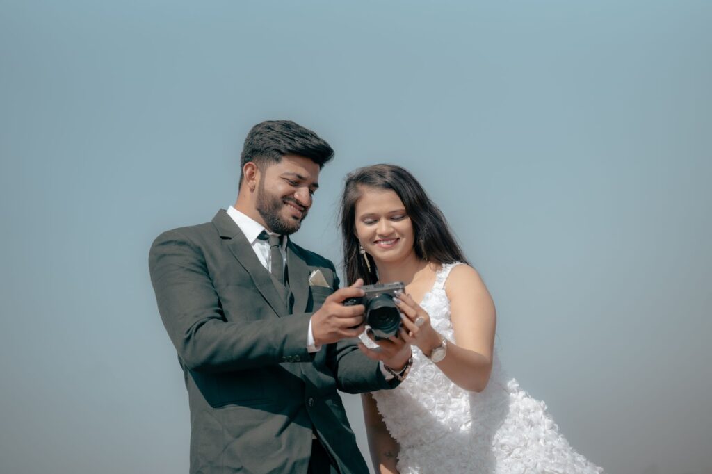 A close-up shot of a wedding photographer capturing candid moments of the couple. — Las Vegas wedding photographers