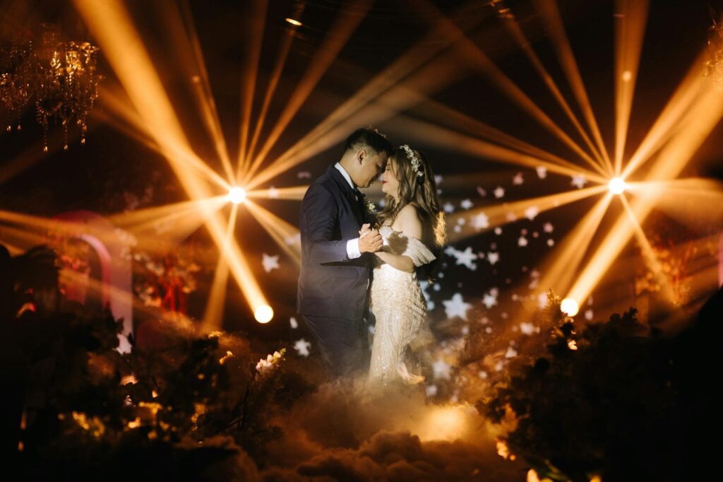 A couple dancing under the stars at an outdoor wedding venue, emphasizing the romantic atmosphere. — Las Vegas wedding v…