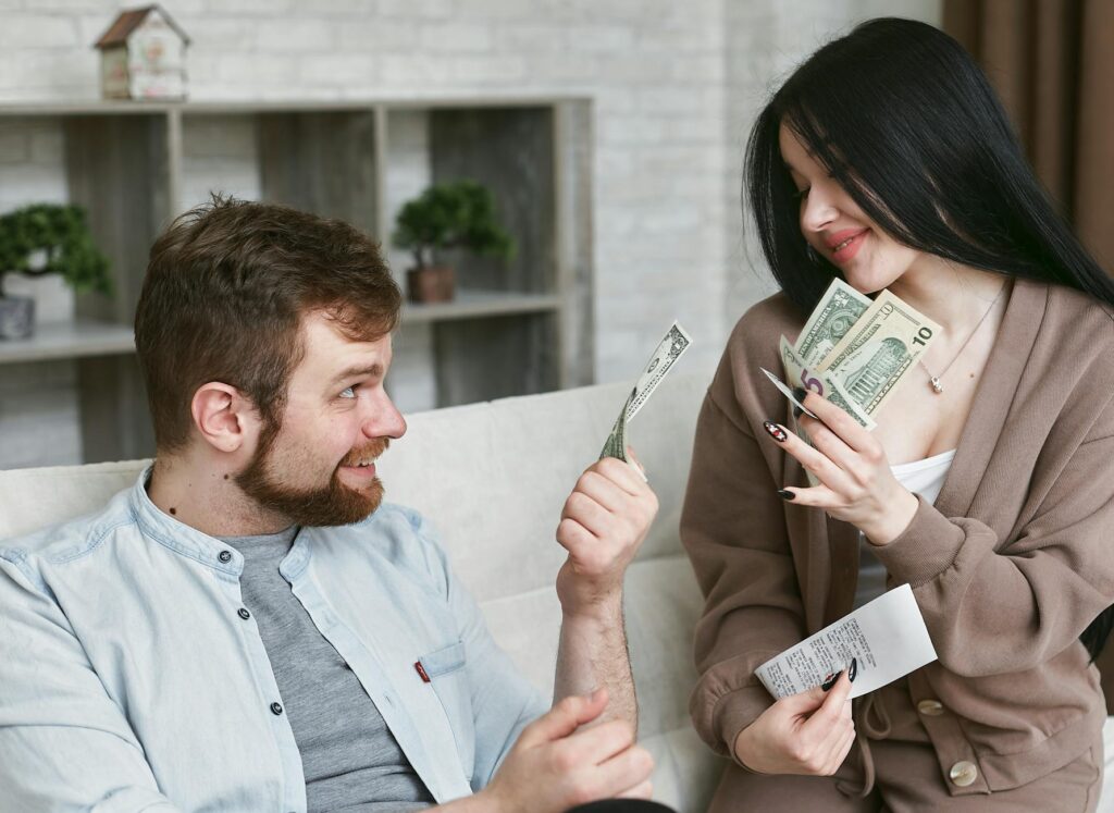 A couple discussing their Las Vegas wedding budget with a planner
