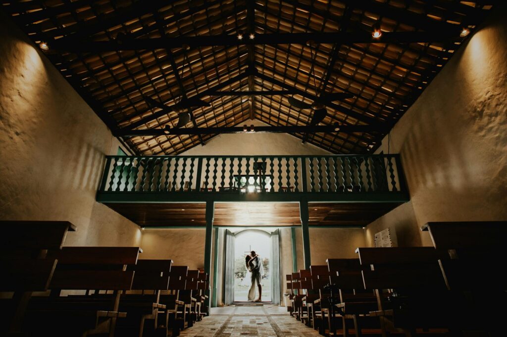 A couple exchanging vows in a beautiful chapel — Las Vegas wedding package