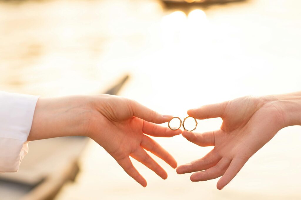 A couple exchanging vows with a stunning desert sunset. — Las Vegas wedding planning checklist