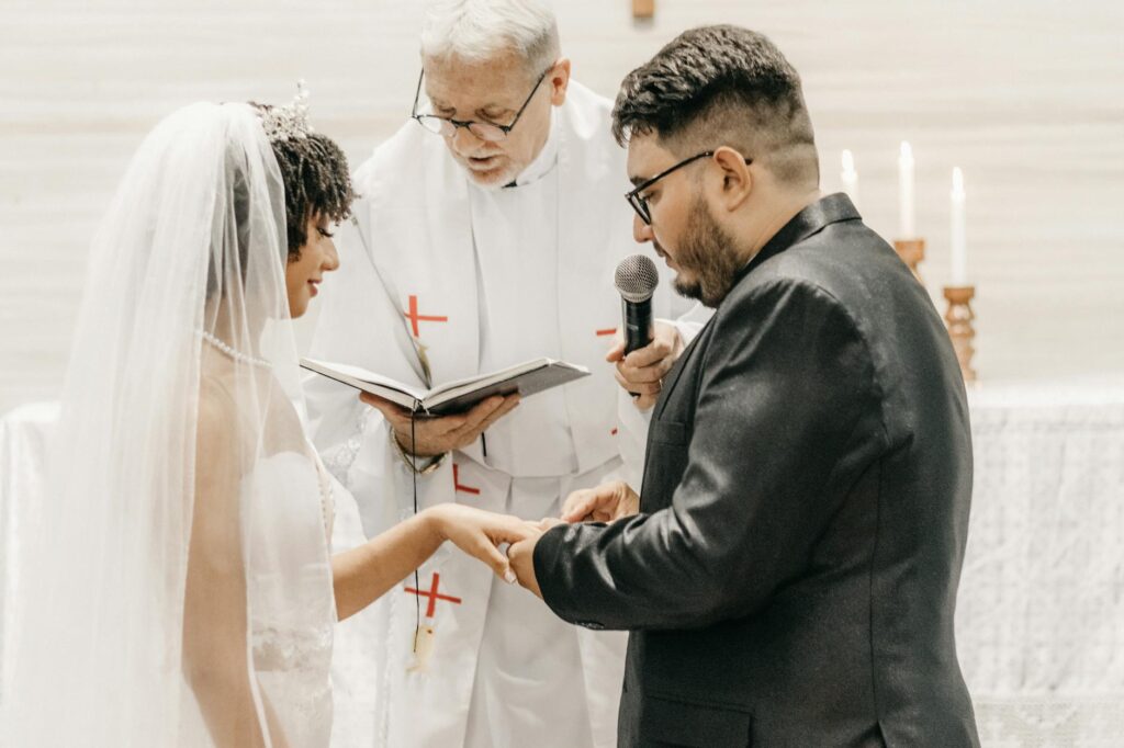 A couple in front of their officiant during a heartfelt wedding vow exchange. — Las Vegas wedding officiants