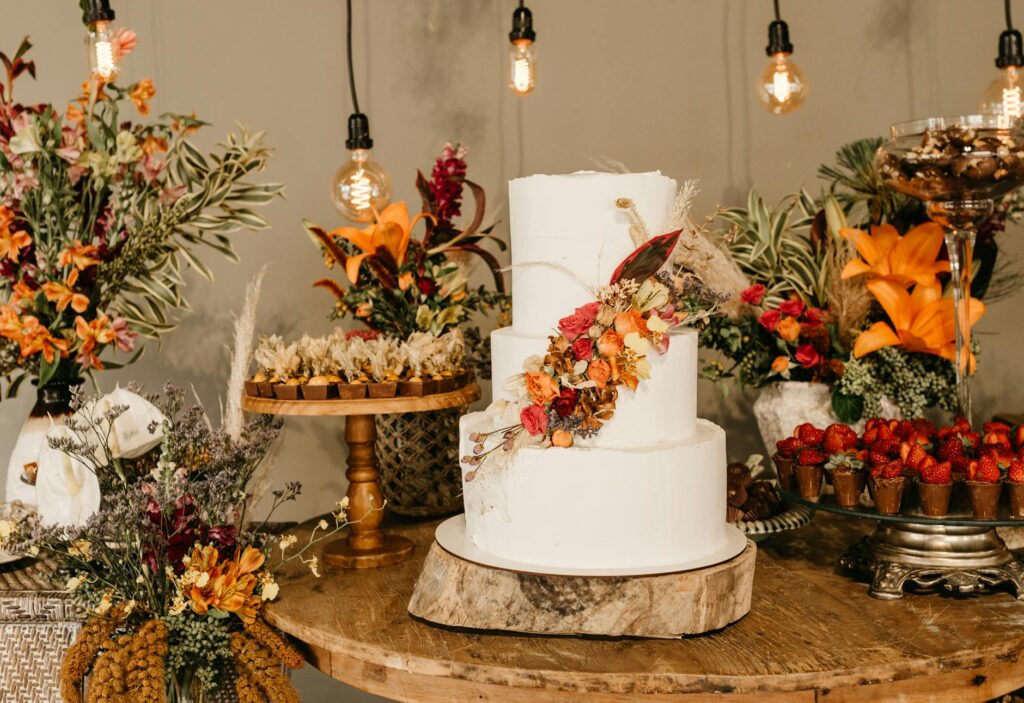 A cozy fall wedding with rich colors, warm lighting, and harvest-themed decor. — Las Vegas wedding trends 2026