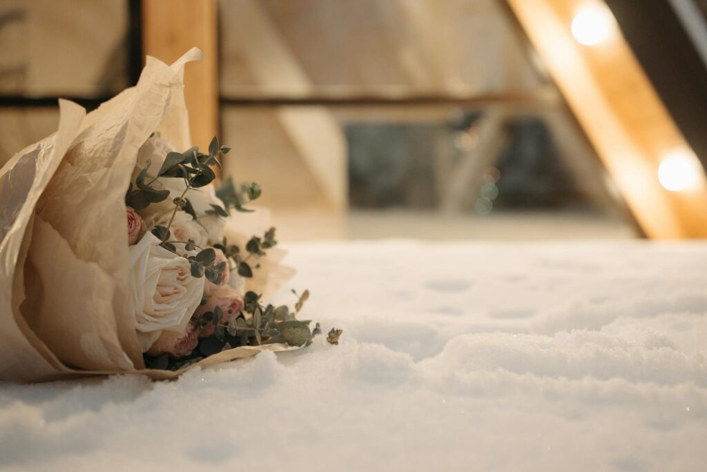 A cozy indoor winter wedding decorated with festive lights. — best time to marry Las Vegas