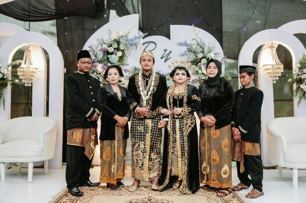 A diverse group of couples showcasing various cultural wedding styles. — Las Vegas wedding trends 2026