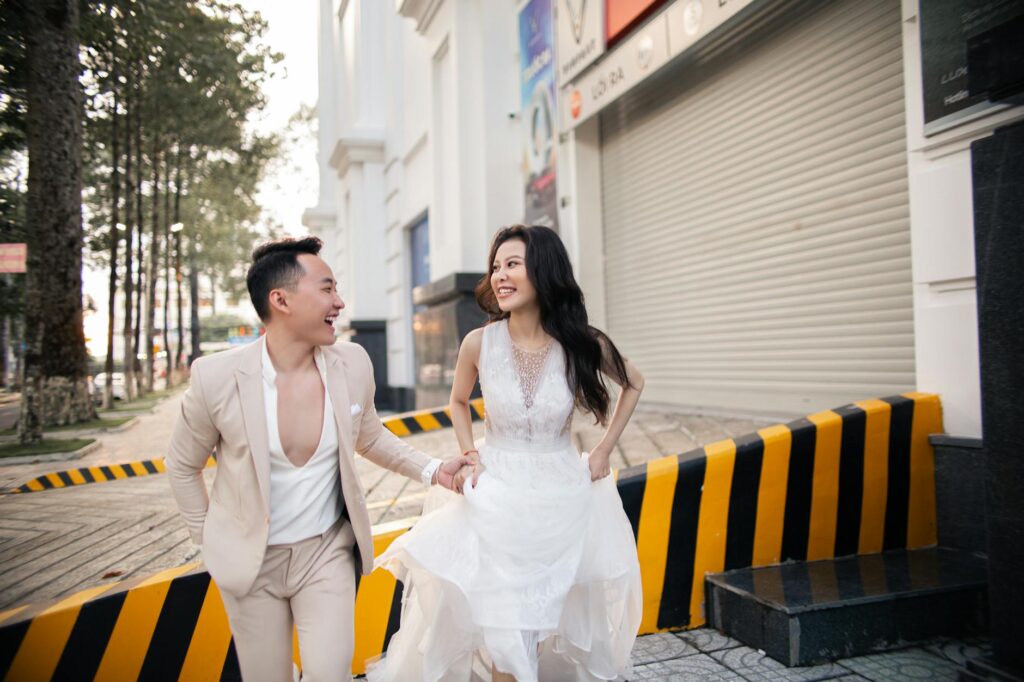 A fun and vibrant shot of a couple after their quick wedding, celebrating in the city — Las Vegas elopement guide