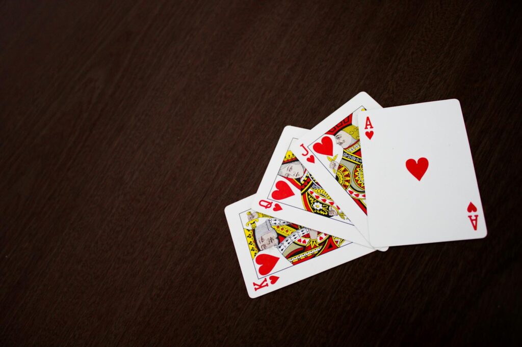 A glamorous Casino Royale wedding scene with poker tables and playing cards as decor. — Las Vegas wedding themes
