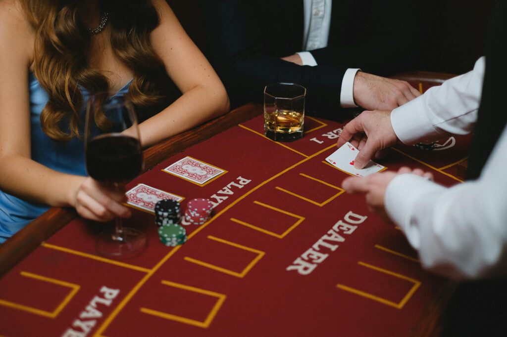 A glamorous casino-themed wedding with playing cards and elegant decor elements. — unique wedding themes Las Vegas