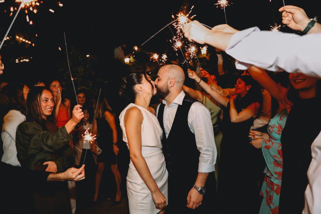 A happy couple celebrating their surprise wedding with friends and family in Las Vegas. — surprise wedding Las Vegas