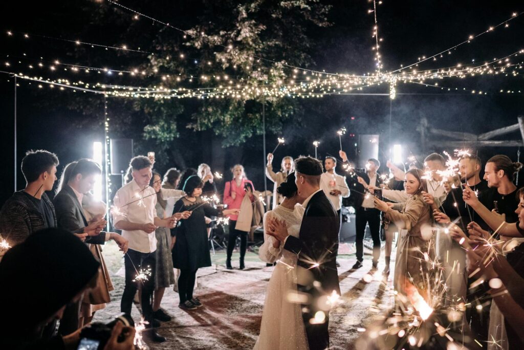 A happy couple celebrating their wedding with friends and family in a unique Las Vegas venue. — destination weddings Las…